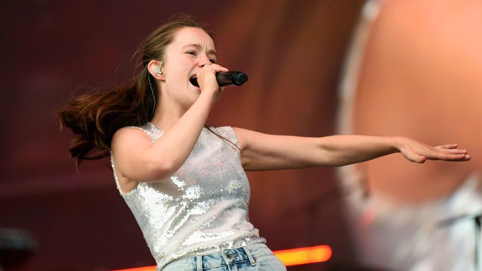 Sigrid performs on stage