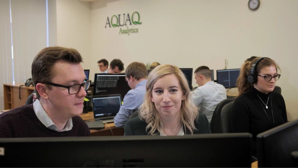 People working at AquaQ Analytics