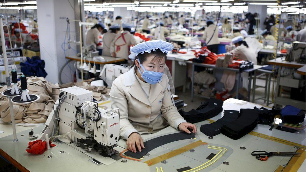 A North Korean employee works in a factory of a South Korean company at Kaesong