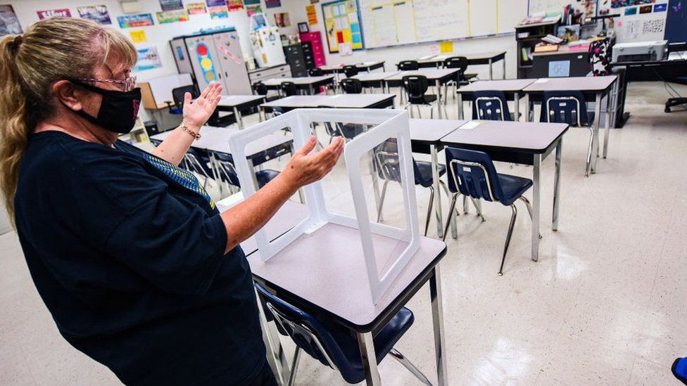 A Florida teacher prepares her classroom for the school year