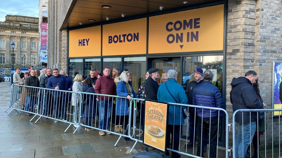 Peter Kay fans queueing outside the Octagon theatre, Bolton, 10/12/23
