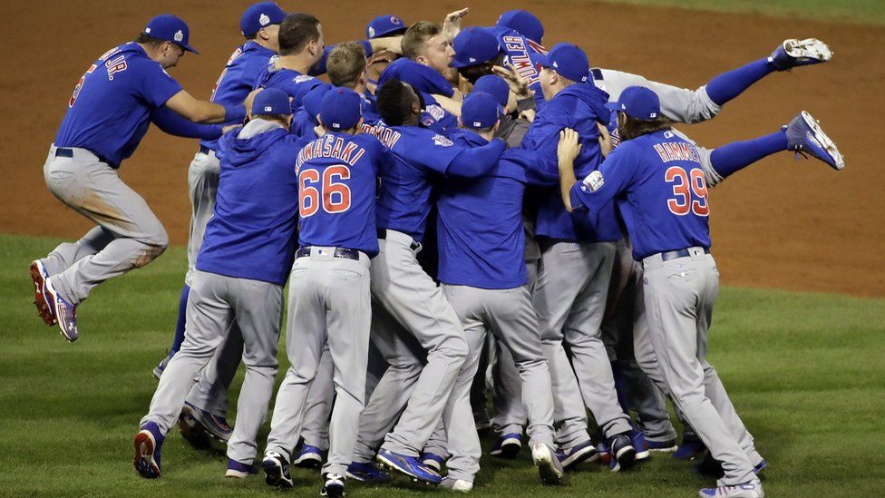 The Chicago Cubs celebrate after Game 7 of the Major League Baseball World Series against the Cleveland Indians Thursday, Nov. 3, 2016, in Cleveland.