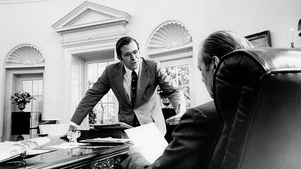 Donald Rumsfeld speaks with U.S. President Gerald Ford in the Oval Office