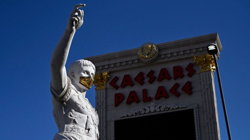 Caesar, of Caesars Palace, wears a mask