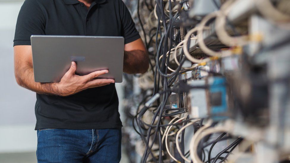 A stock image of computers mining cryptocurrency