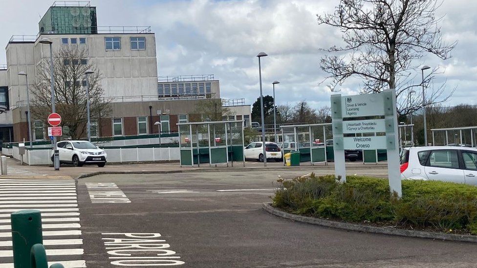 Covid: DVLA staff strike over 'fear' at Swansea HQ - BBC News