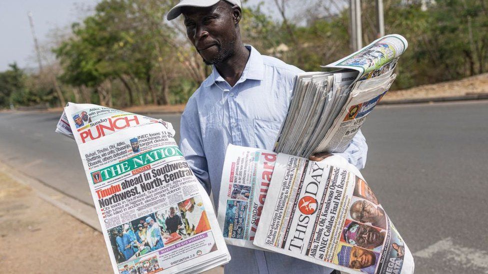 A newspaper venue in Nigeria before final presidential election results were announced.