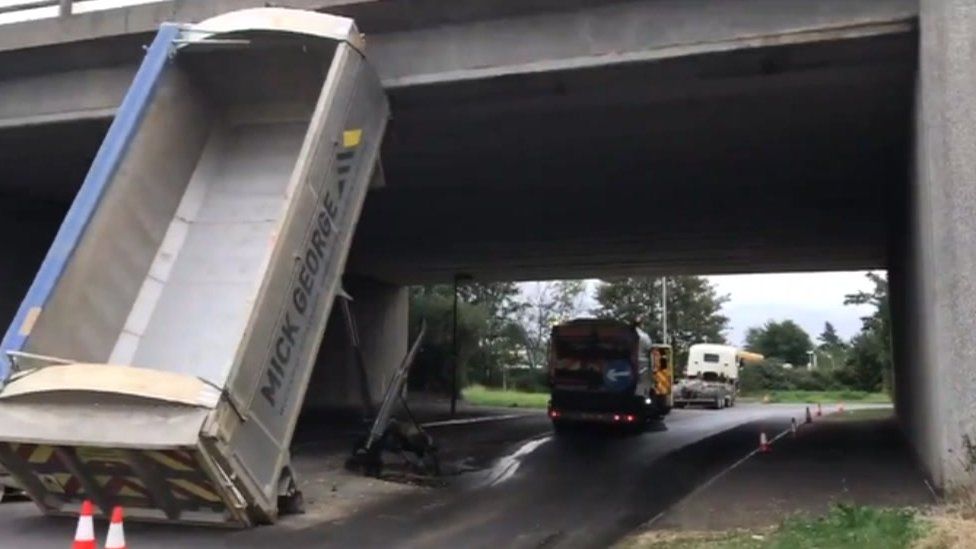 Lorry stuck on bridge