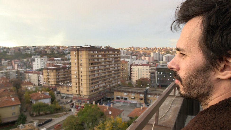 Carl Miller looks over the city of Pristina