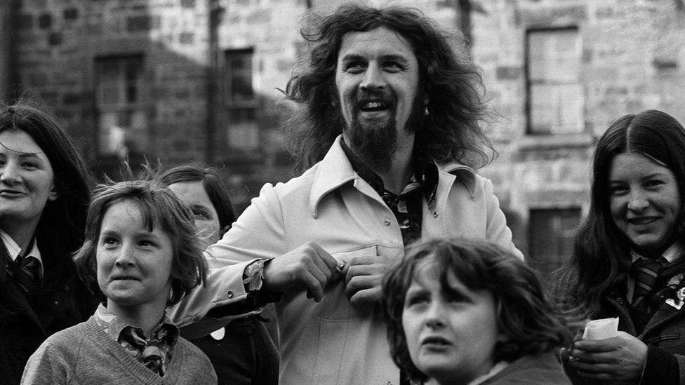 Billy Connolly with children in 1975