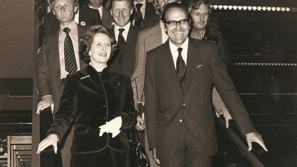 Margaret Thatcher with Jim Matthews on the John Lewis escalator on 25 September 1979