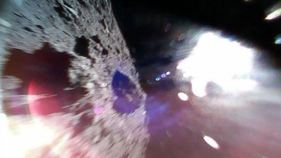 A picture of the asteroid taken by a robot rover and tweeted by a JAXA account.