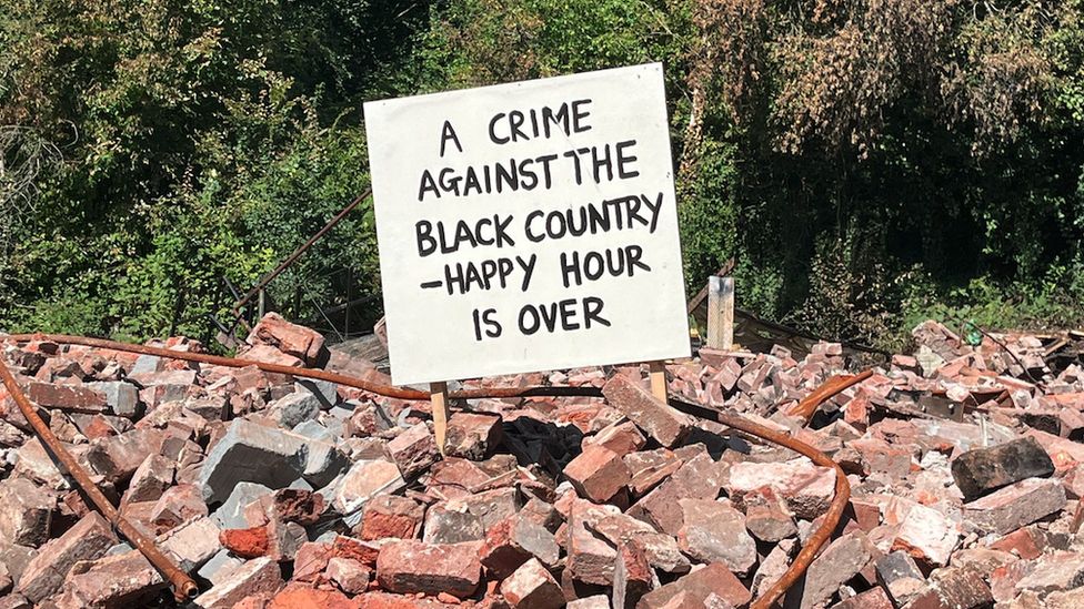Sign saying "A crime against the Black Country - happy hour is over"