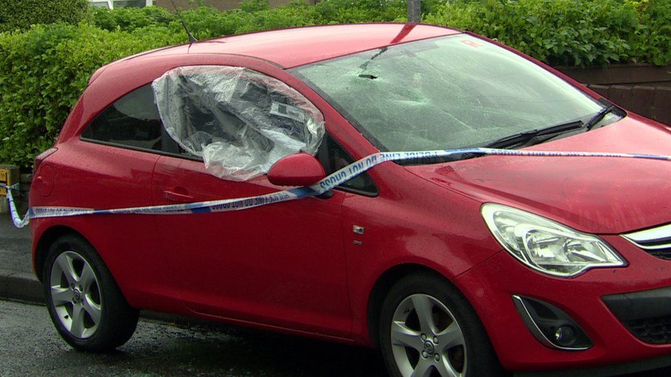 A car with a damaged window