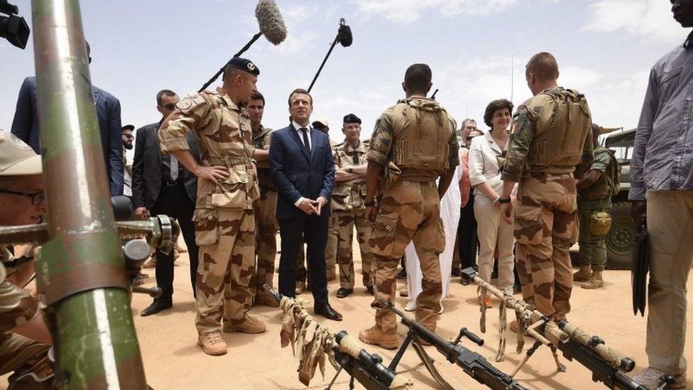 French President Emmanuel Macron visits French troops in Africa"s Sahel region in Gao, northern Mali, 19 May 2017