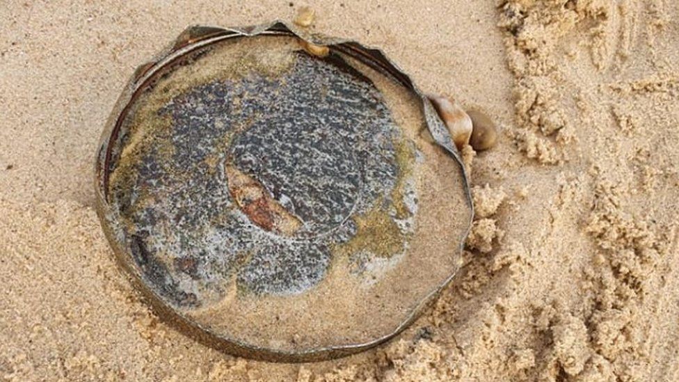 Photos showed the base of the bucket sticking slightly out of the sand on Sizewell beach