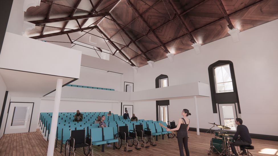 An artist's impression shows a band performing in an auditorium with accessible features