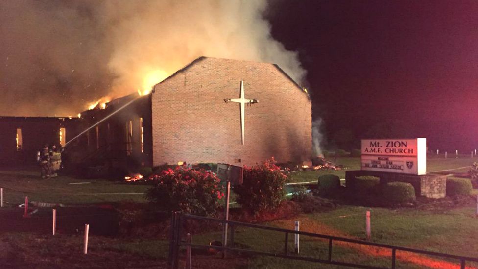 Fire crews try to control a blaze at the Mt Zion AME Church in Greeleyville, South Carolina - 30 July 2015