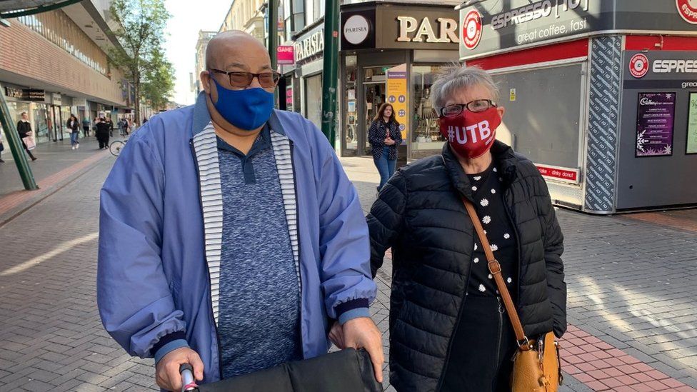Couple in Middlesbrough town centre wearing masks