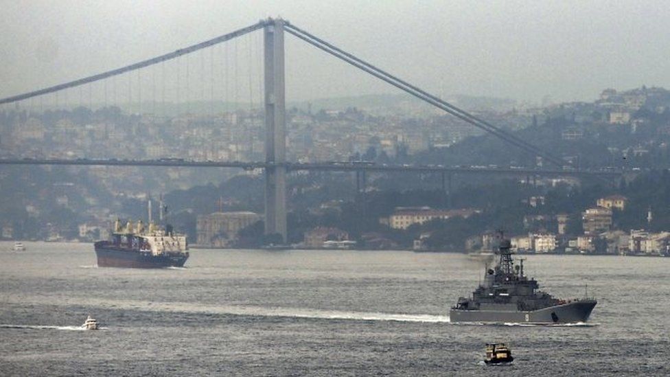 A Russian warship passes through the Bosphorus, in Istanbul, en route to the Mediterranean Sea, Tuesday, Oct. 6, 2015.