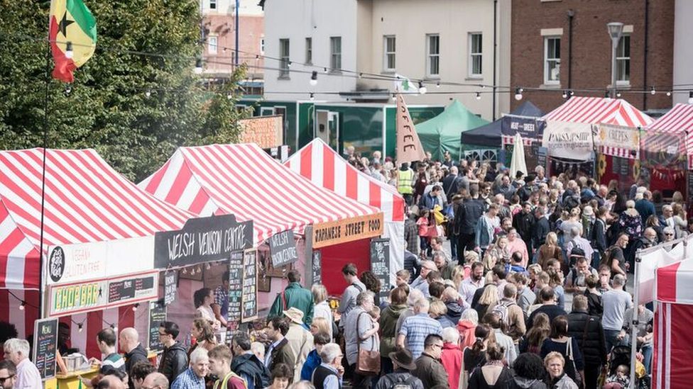 Festival goers fill a road of market stalls at Abergavenny Food Festival 2017