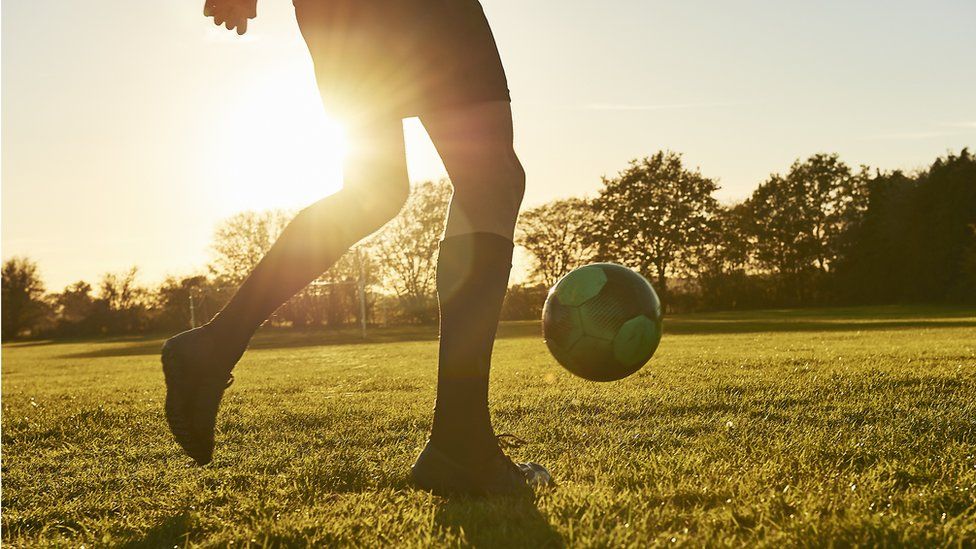 Young footballer training