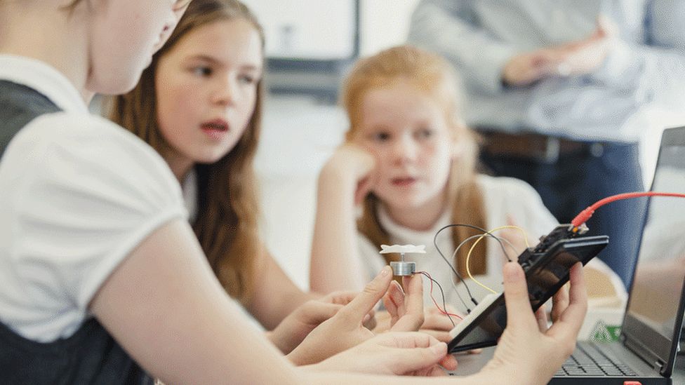 Girls in a computing lesson