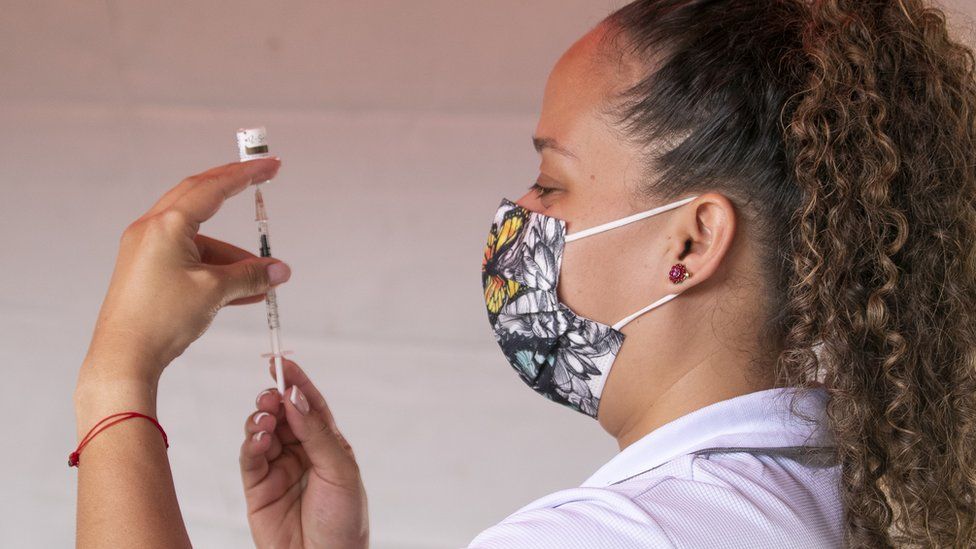 Nurse prepares the vaccine as part of the national vaccination campaign against Covid-19 on 7 May in Escazu, Costa Rica