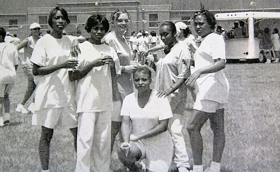 Angela, third from left, became friends with a group of Jamaican women in prison