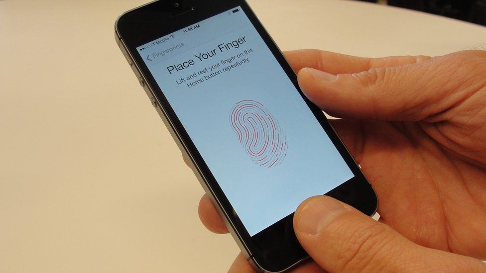 Apple's Touch ID system being demonstrated on iPhone