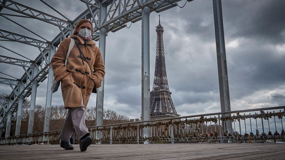 Woman wearing face mask in Paris