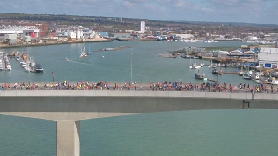 Marathon runners on Itchen Bridge