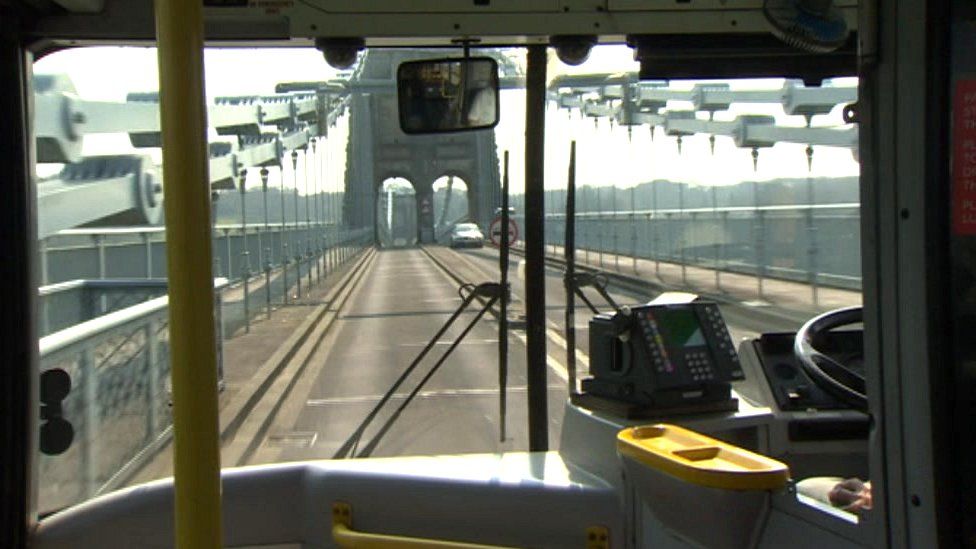 Bus travelling across the Menai Bridge