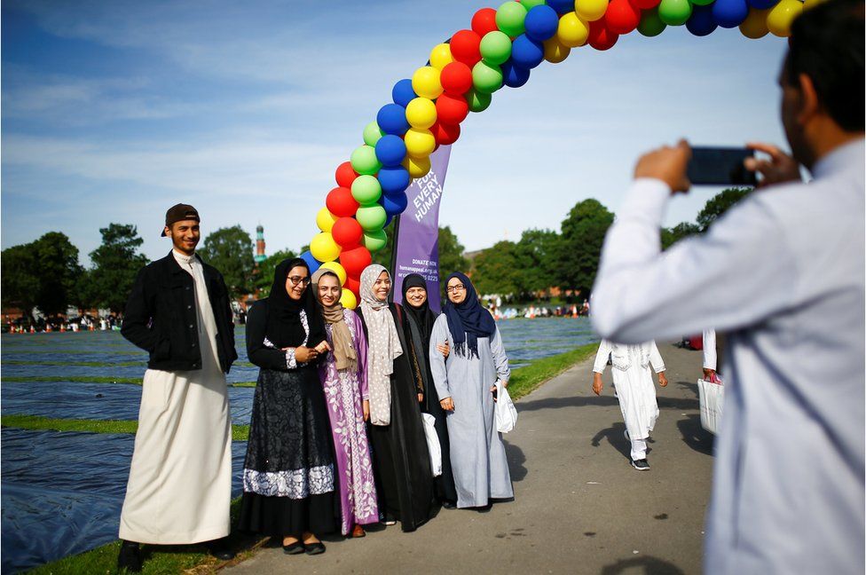 Muslims gather for Eid al-Fitr prayers to mark the end of Ramadan, in Small Heath Park in Birmingham, Britain, June 15, 2018