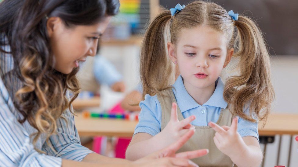 Schools need to improve money lessons, says Estyn - BBC News