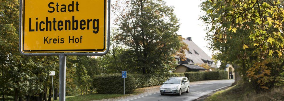 A city limits sign stands at the town edge on October 17, 2016 in Lichtenberg, Germany
