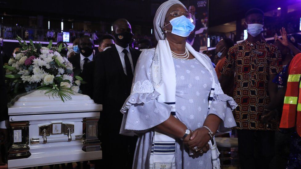 TB Joshua's wife in front of his casket