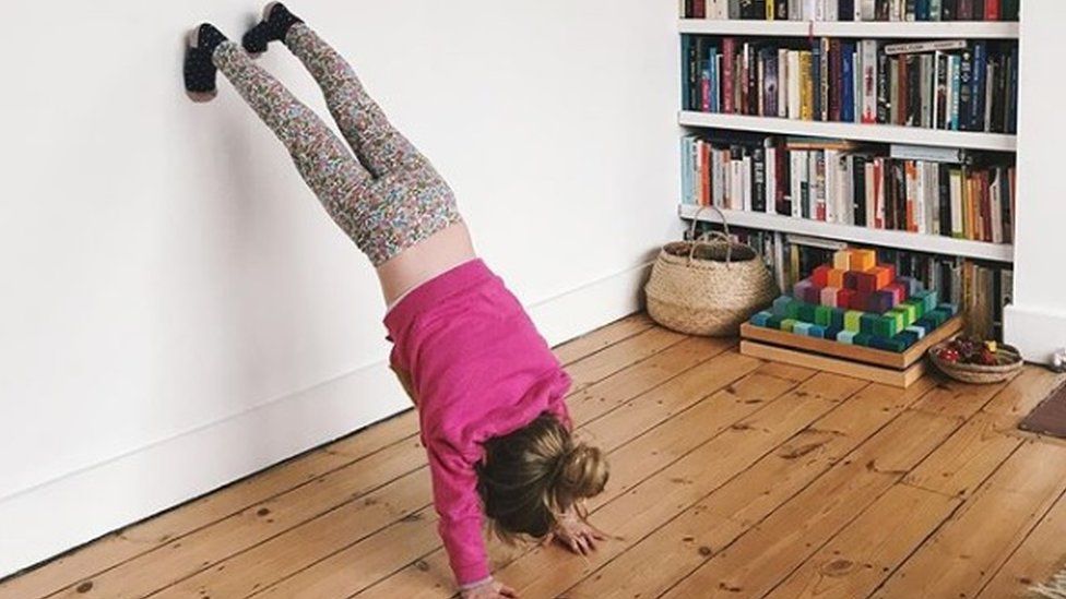 Girl doing handstand