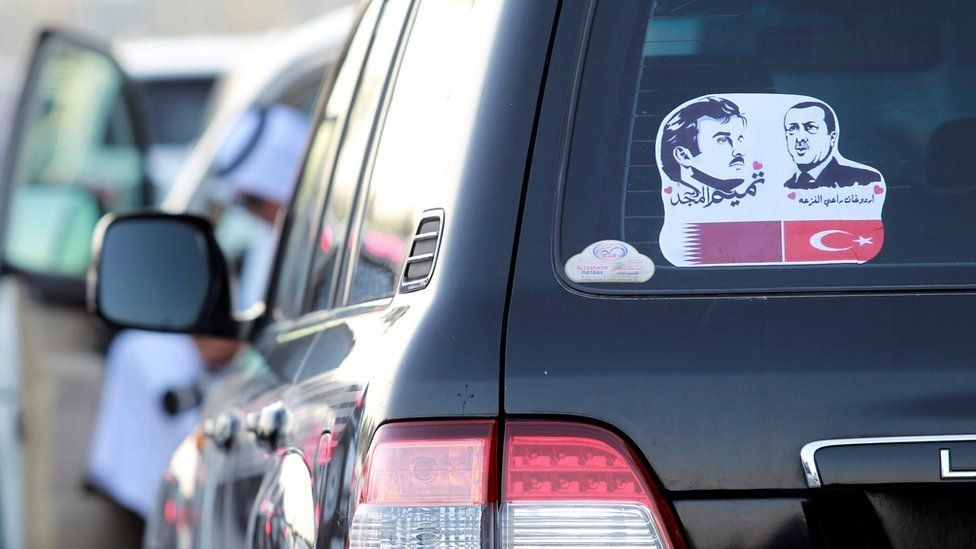Car sticker of the Qatari emir and Turkish president in Doha on 11 June 2017