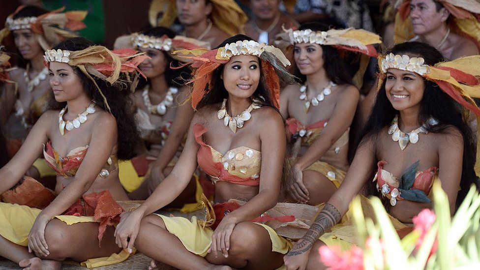 Dancers in traditional costume at an event in Papeete