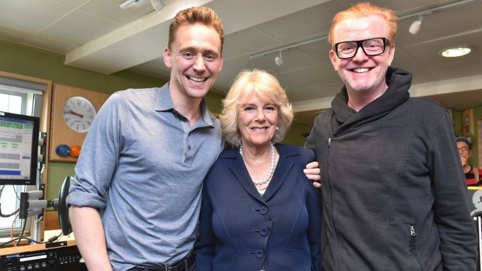 Tom Hiddleston breaches royal protocol with a shoulder squeeze for The Duchess of Cornwall in 2016