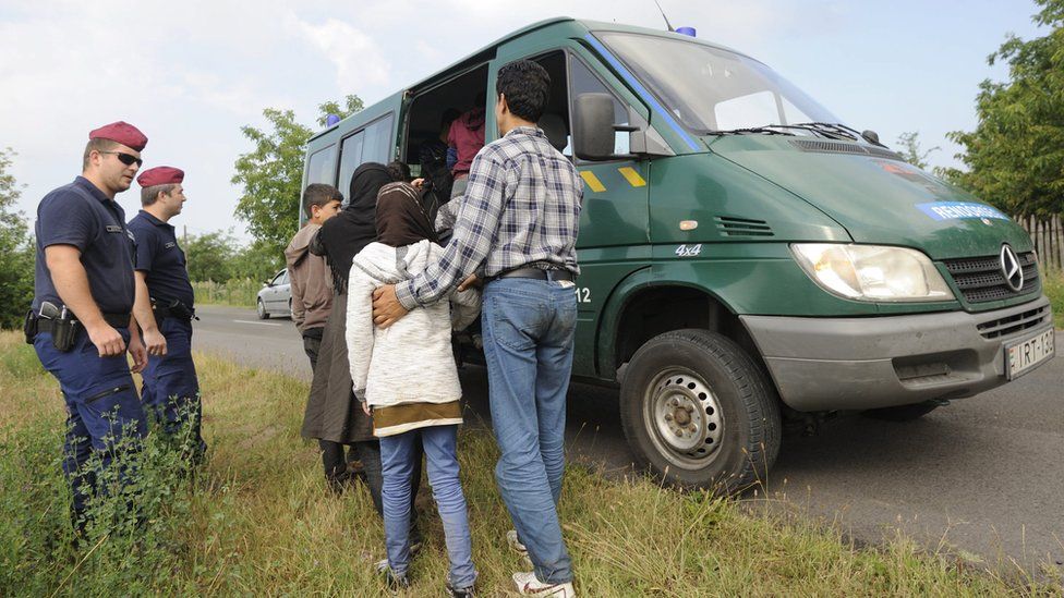 Afghan migrants stopped by police near Asotthalom, southern Hungary, 30 Jun 15