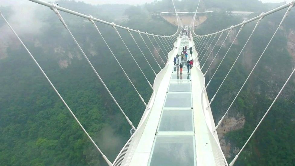 China's Zhangjiajie glass bridge closes after two weeks - BBC News