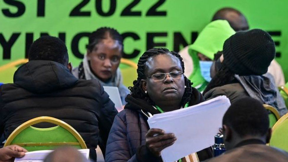 Independent Electoral and Boundaries Commission (IEBC) clerks work to verify presidential results of the just concluded general election in the national tallying centre