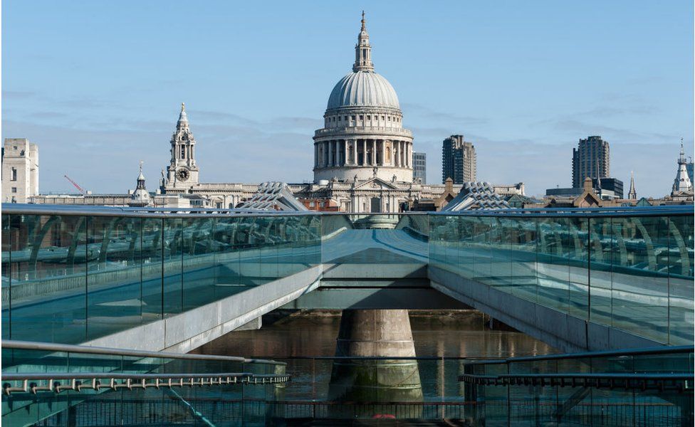 An empty Millennium Bridge and St Paul's Cathedral