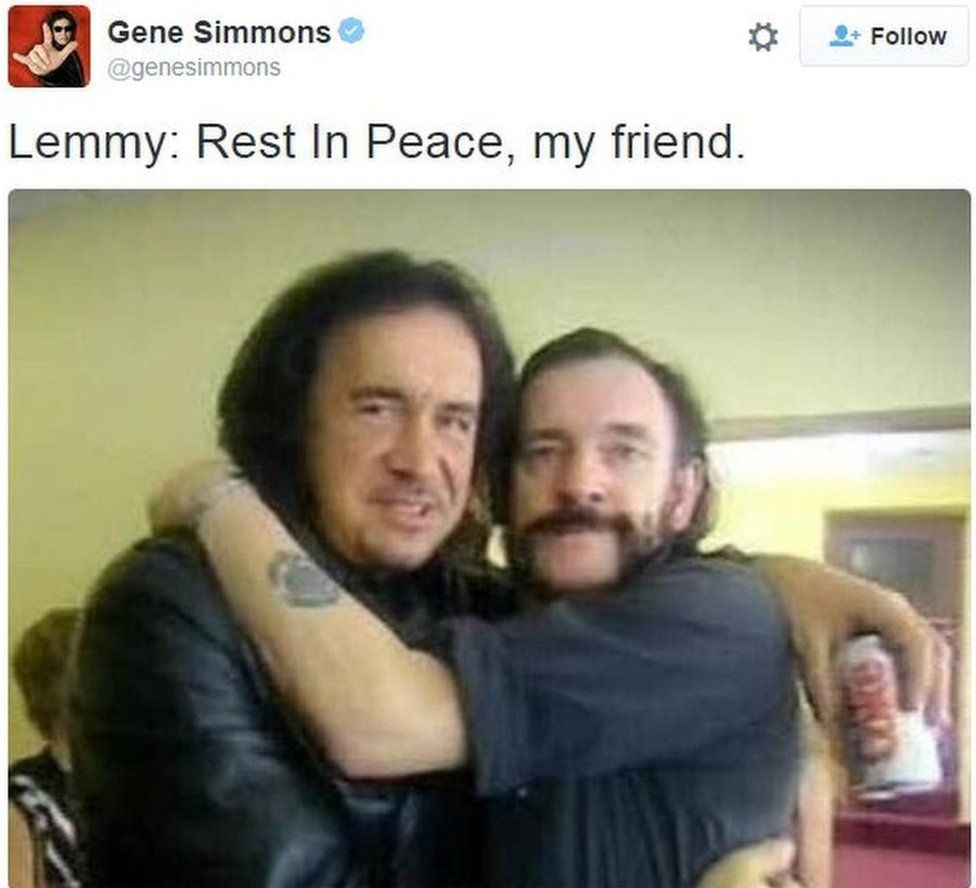 Kiss frontman Gene Simmons hugging Lemmy