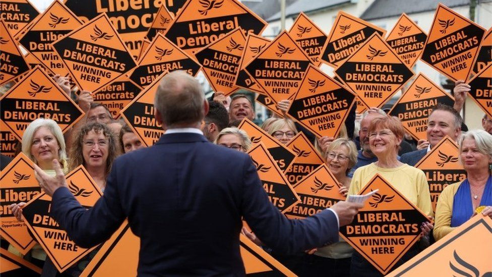 Ed Davey gestures during Liberal Democrat MP for Tiverton and Honiton Richard Foord"s victory rally, in Tiverton,