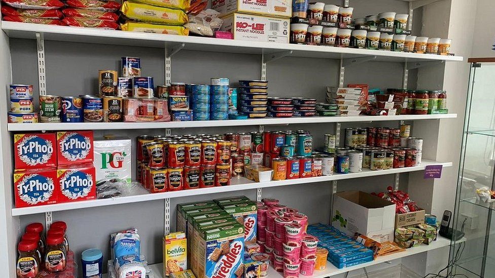 Shelves of food for emergency food parcels