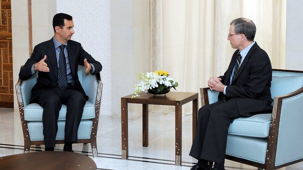 file handout picture released by the Syrian Arab News Agency and dated January 27, 2011 shows Syrian President Bashar al-Assad (L) meeting with new US ambassador Robert Ford after receiving his credentials in Damascus.