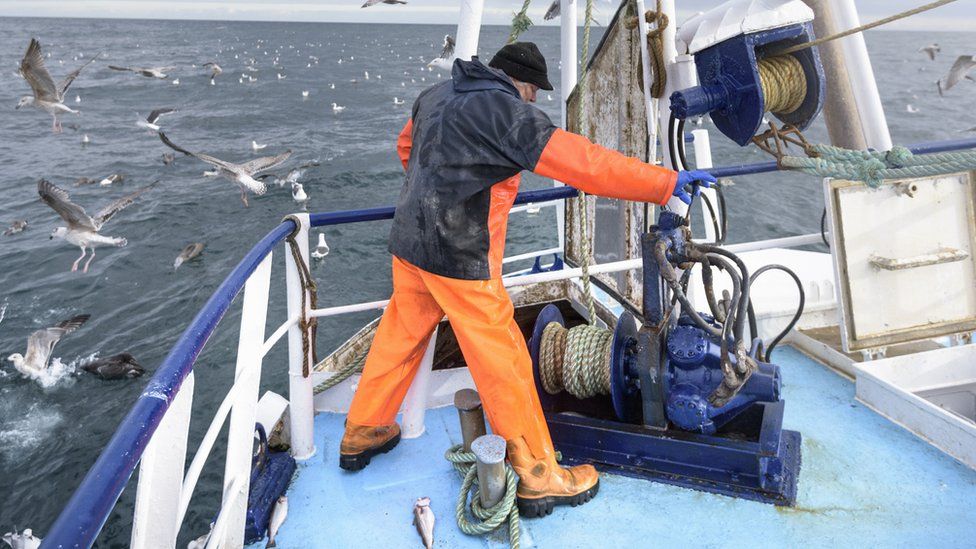 Fisherman on trawler